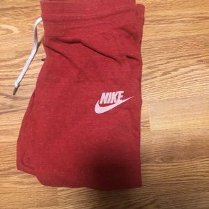 Red Nike joggers